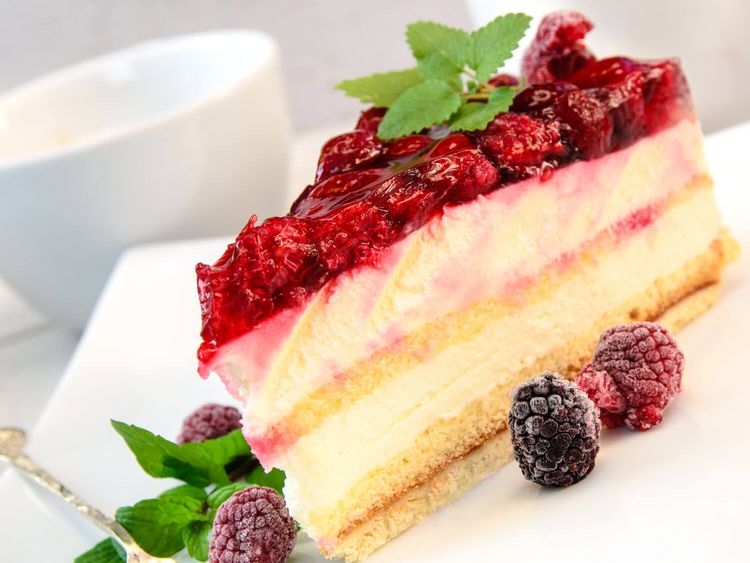 Himbeerkuchen und Tasse Kaffee